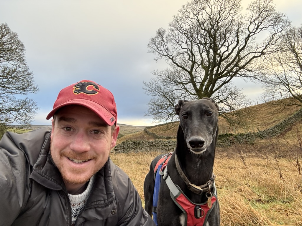 Chris and Fred (greyhound) in the countryside